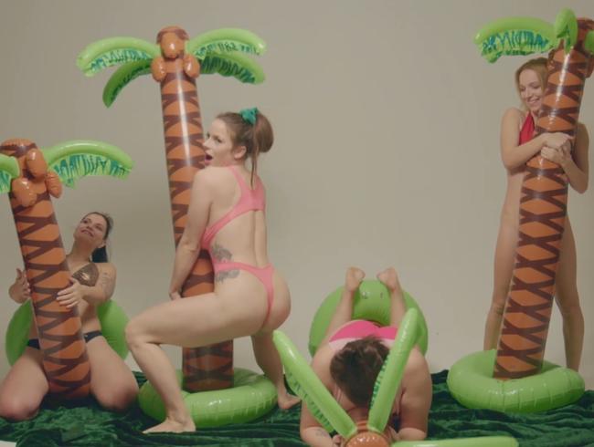 4 girls with inflatable palm trees
